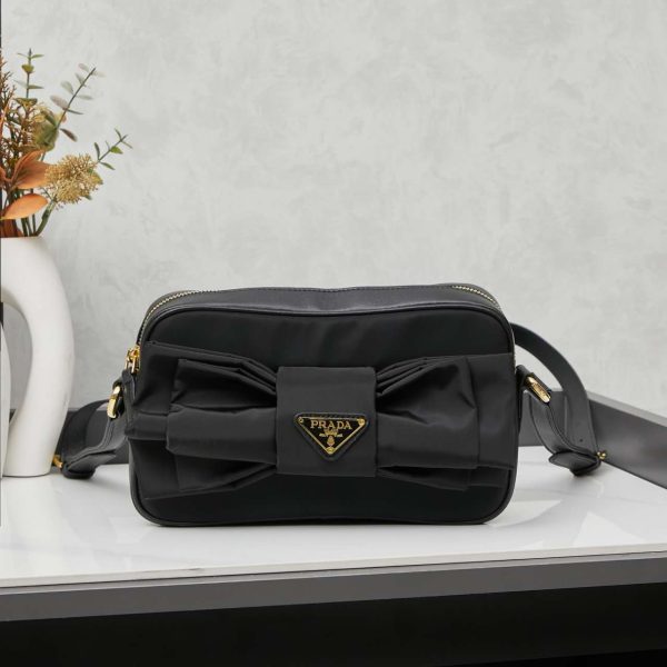 Re-Nylon and nappa leather Small shoulder bag with bow