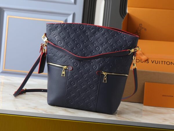 Monogram Melie embossed navy blue