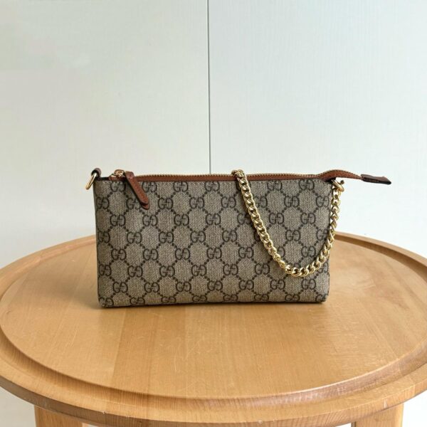 GG Supreme Monogram Wrist Wallet