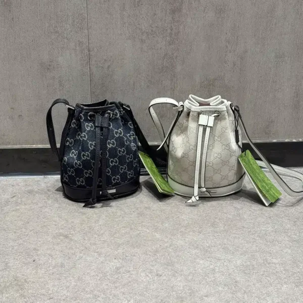 Mini bucket bag with Gucci plaque